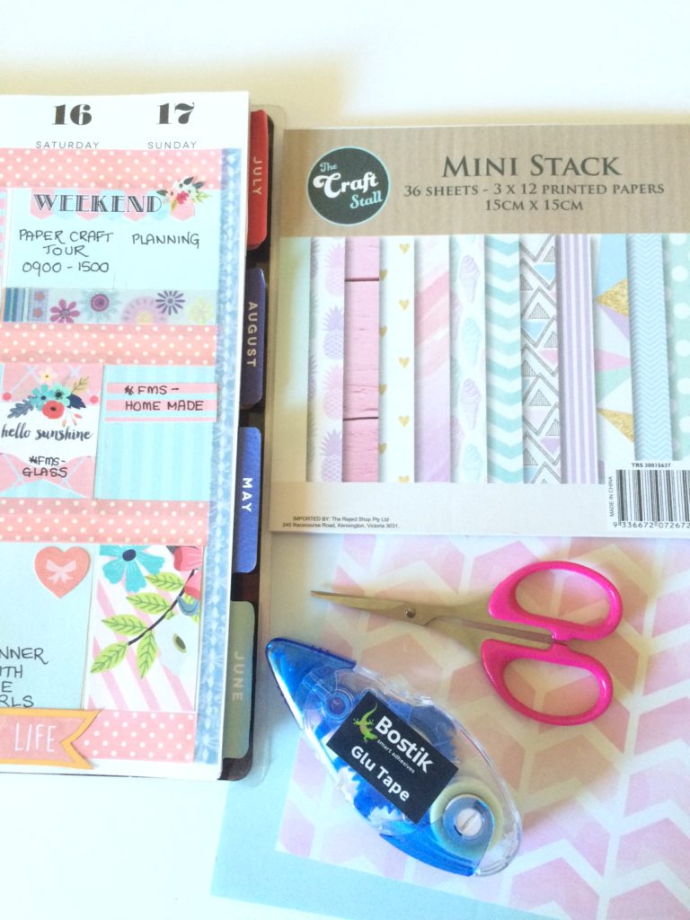 Using scrapbooking paper to decorate your planner