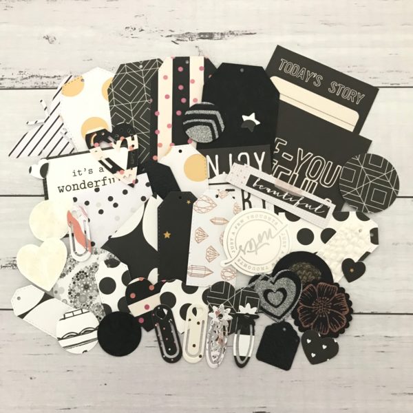 Black, white and foiled die cut pack